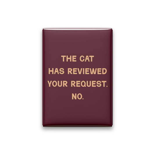 “The cat has reviewed your request. No.” oxblood quote magnet on white