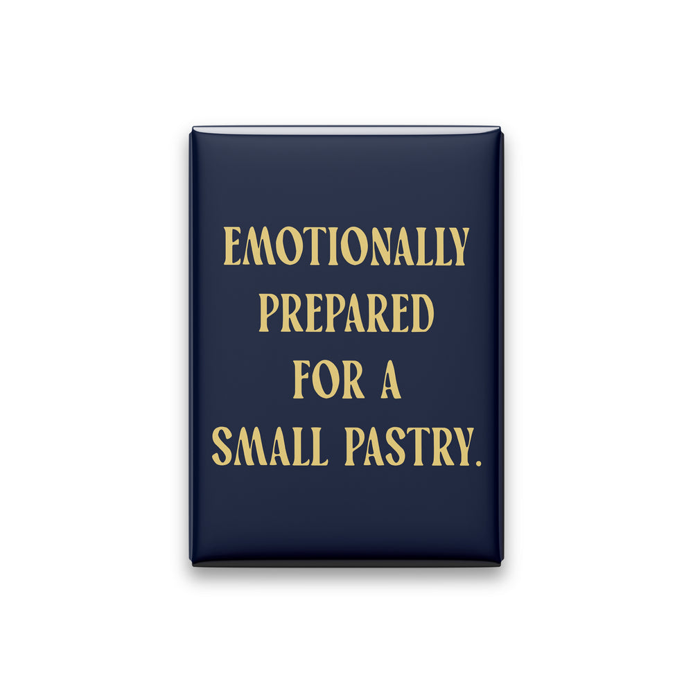“Emotionally prepared for a small pastry.” midnight quote magnet on white