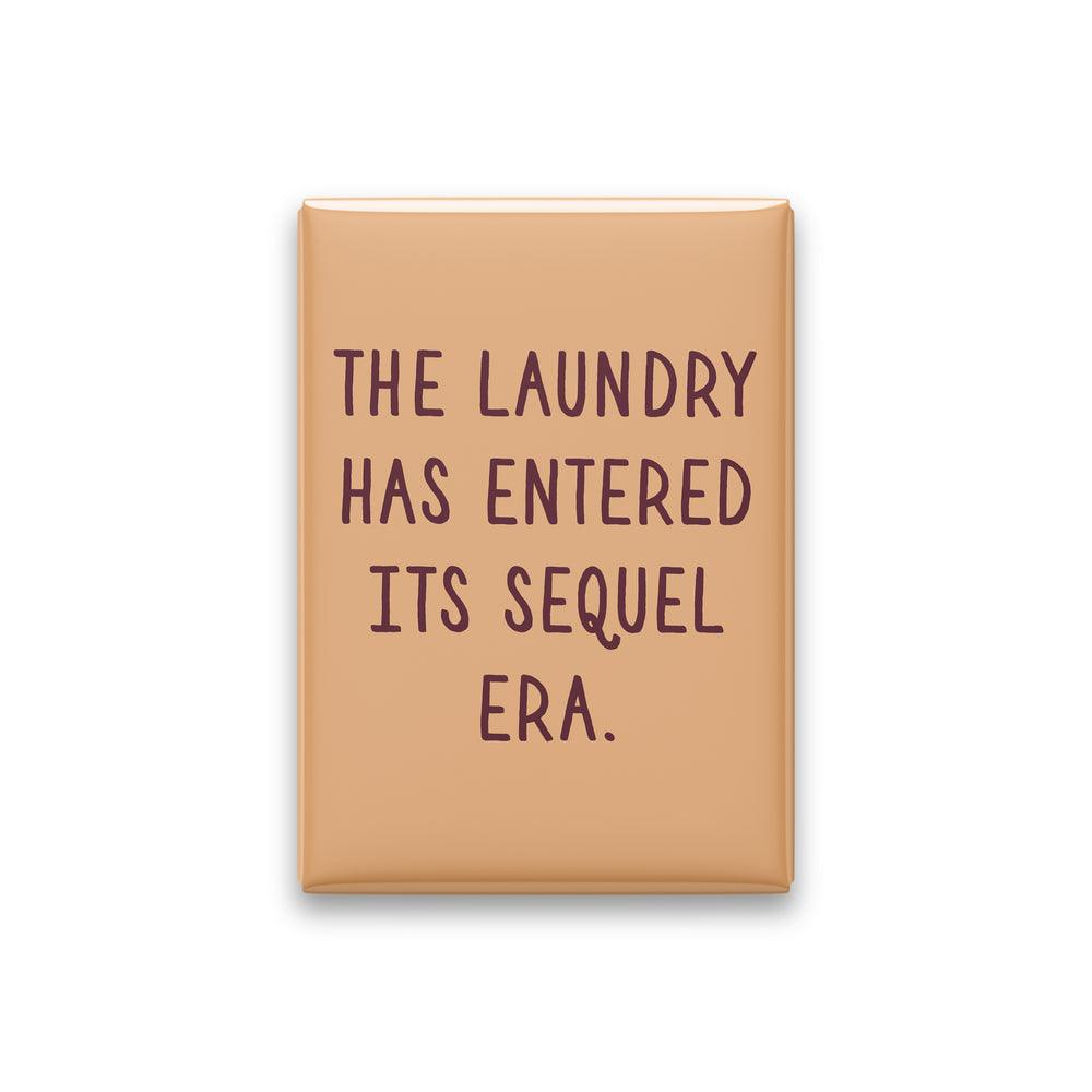 “The laundry has entered its sequel era.” apricot quote magnet on white