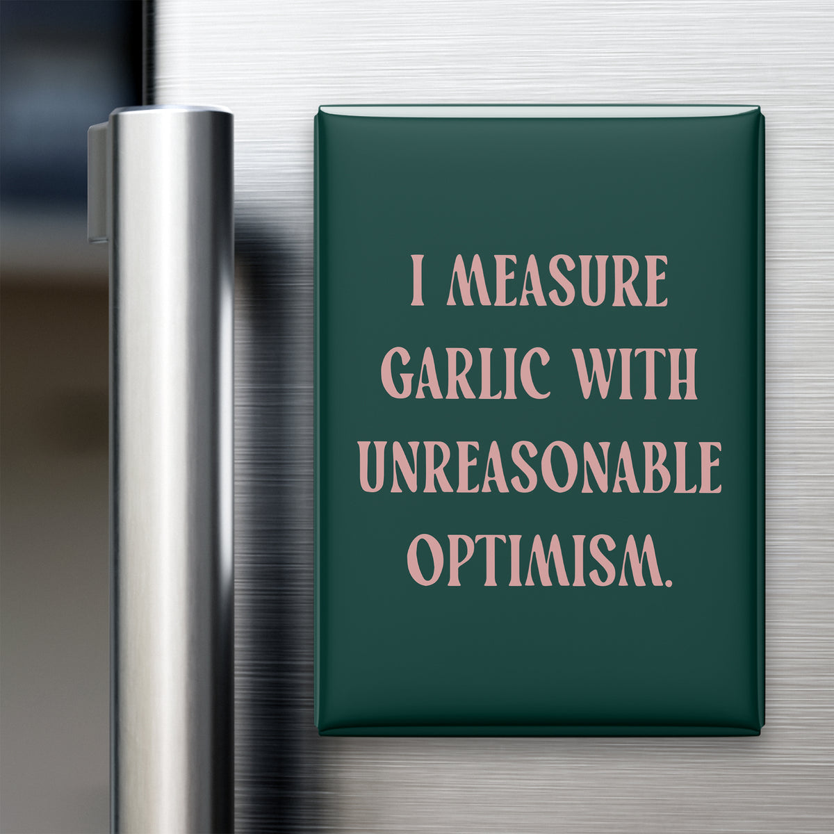 “I measure garlic with unreasonable optimism.” quote magnet displayed on a refrigerator