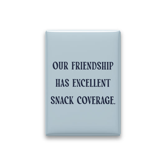 “Our friendship has excellent snack coverage.” powder quote magnet on white