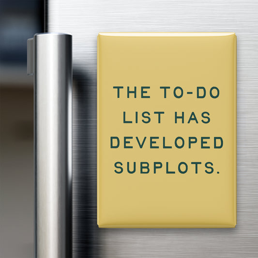 “The to-do list has developed subplots.” quote magnet displayed on a refrigerator
