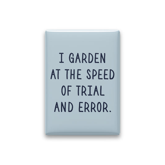 “I garden at the speed of trial and error.” powder quote magnet on white