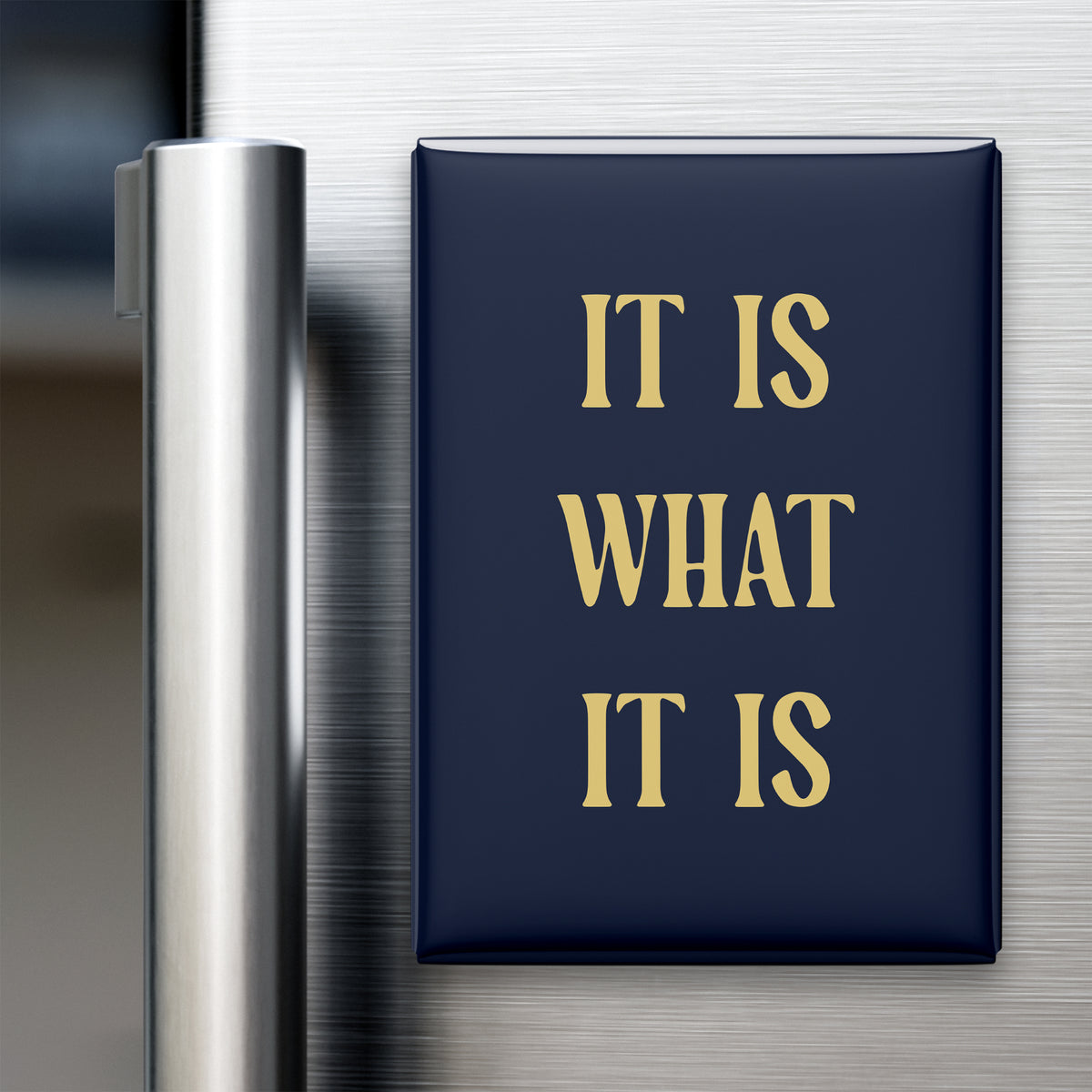 “It is what it is.” quote magnet displayed on a refrigerator