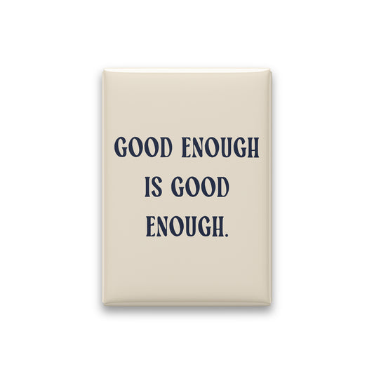 “Good enough is good enough.” parchment quote magnet on white
