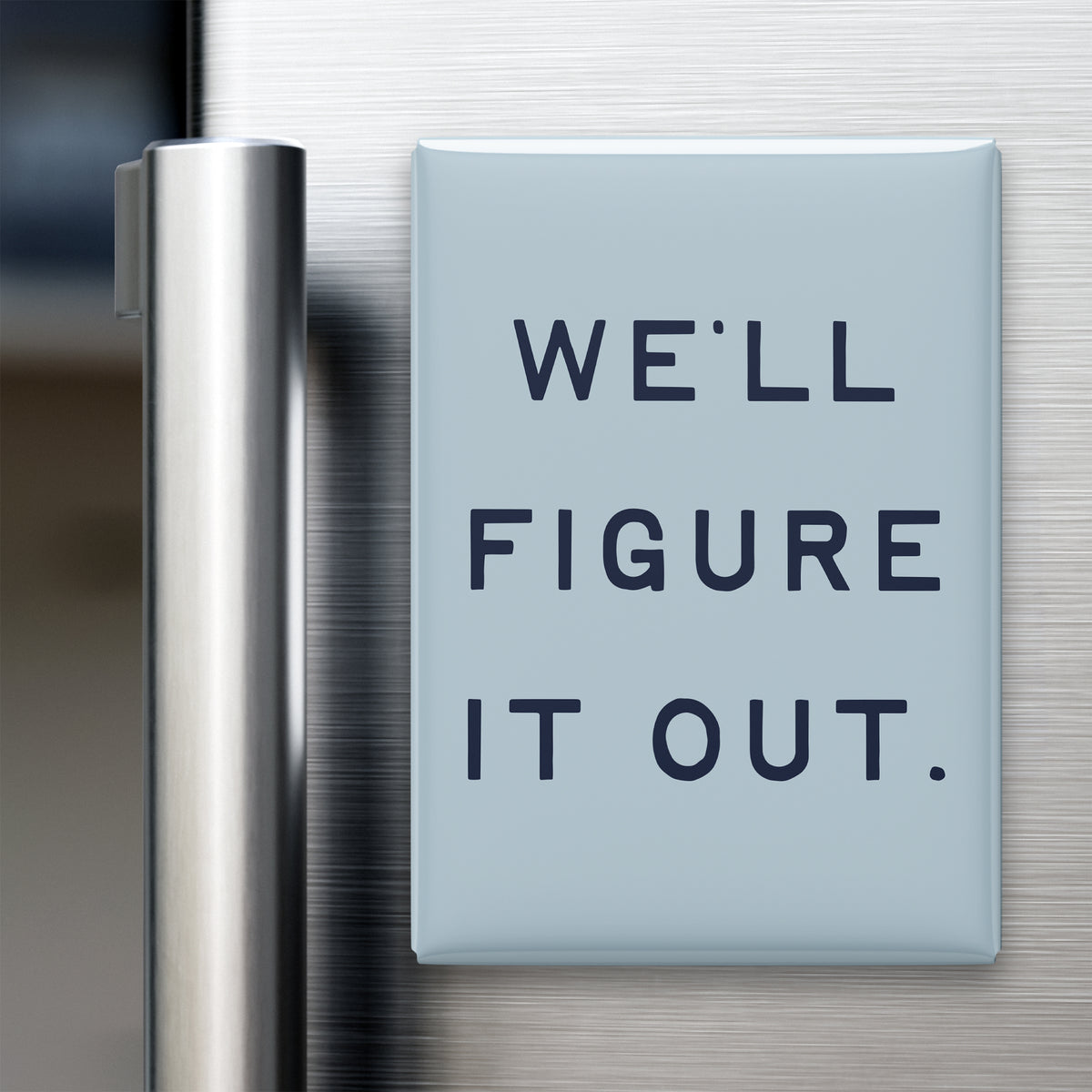 “We'll figure it out.” quote magnet displayed on a refrigerator