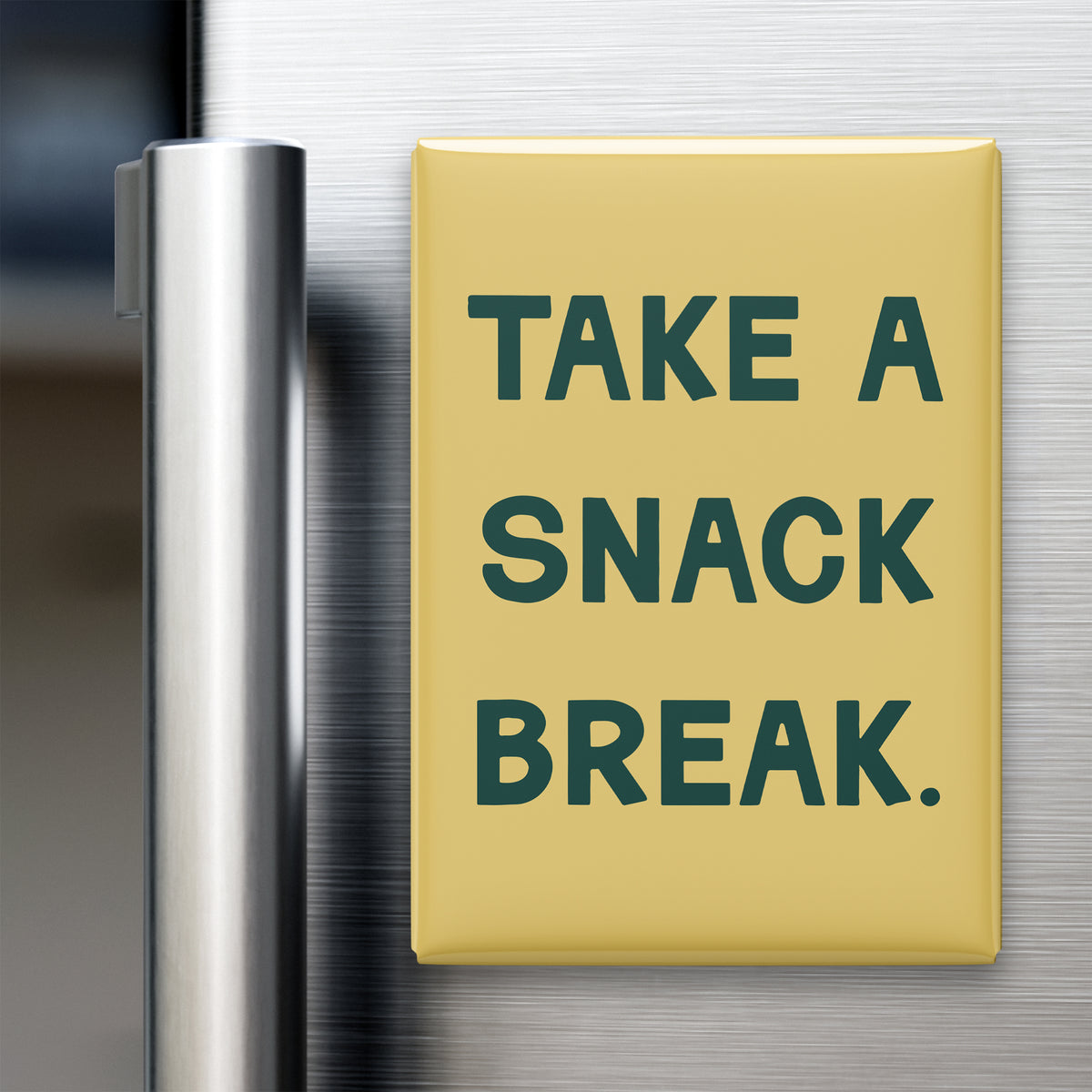 “Take a snack break.” quote magnet displayed on a refrigerator
