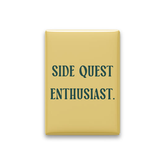 “Side quest enthusiast.” butter quote magnet on white