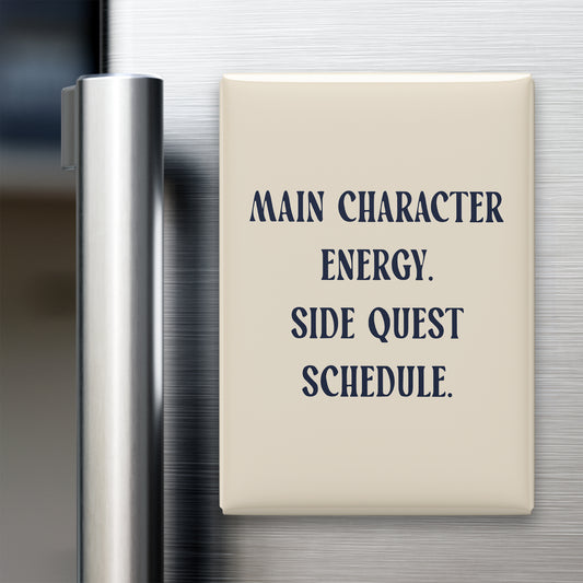 “Main character energy. Side quest schedule.” quote magnet displayed on a refrigerator