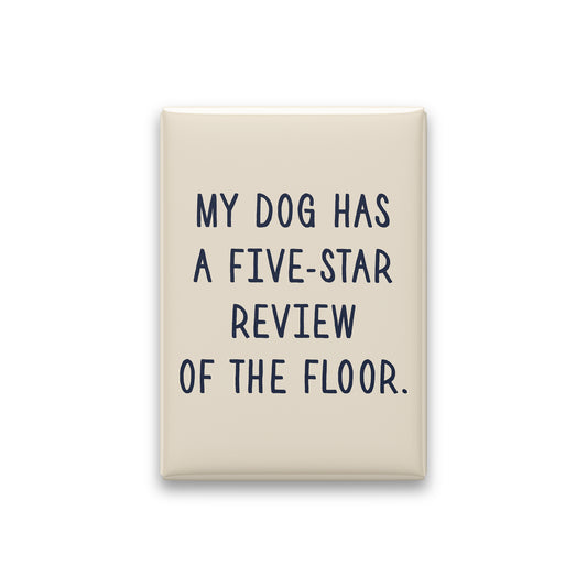 “My dog has a five-star review of the floor.” parchment quote magnet on white