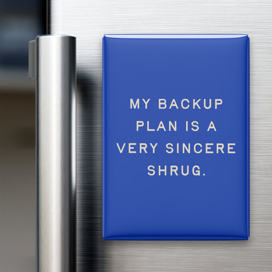 “My backup plan is a very sincere shrug.” quote magnet displayed on a refrigerator