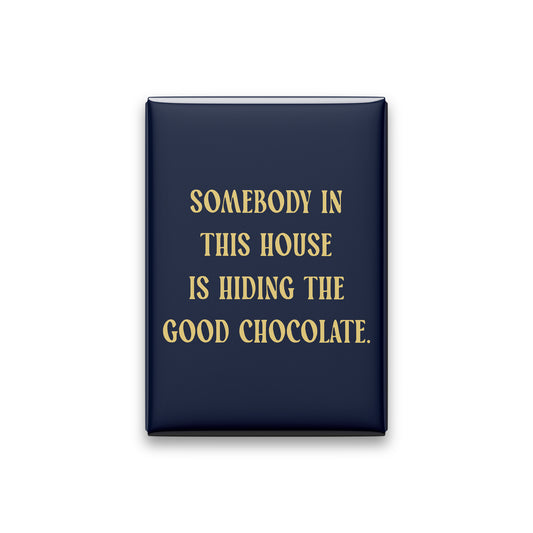 “Somebody in this house is hiding the good chocolate.” midnight quote magnet on white