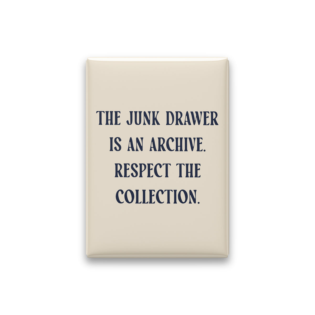 “The junk drawer is an archive. Respect the collection.” parchment quote magnet on white