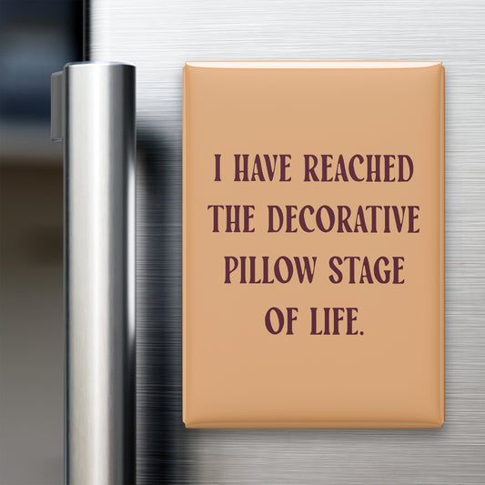 “I have reached the decorative pillow stage of life.” quote magnet displayed on a refrigerator