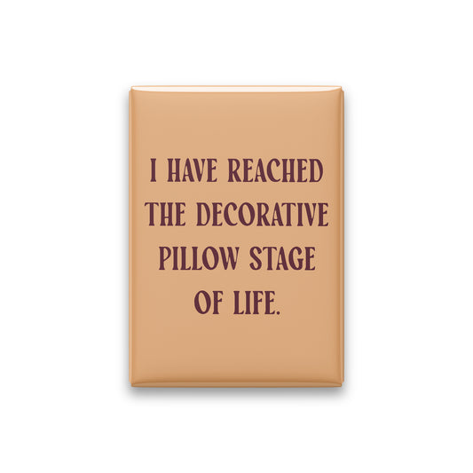 “I have reached the decorative pillow stage of life.” apricot quote magnet on white