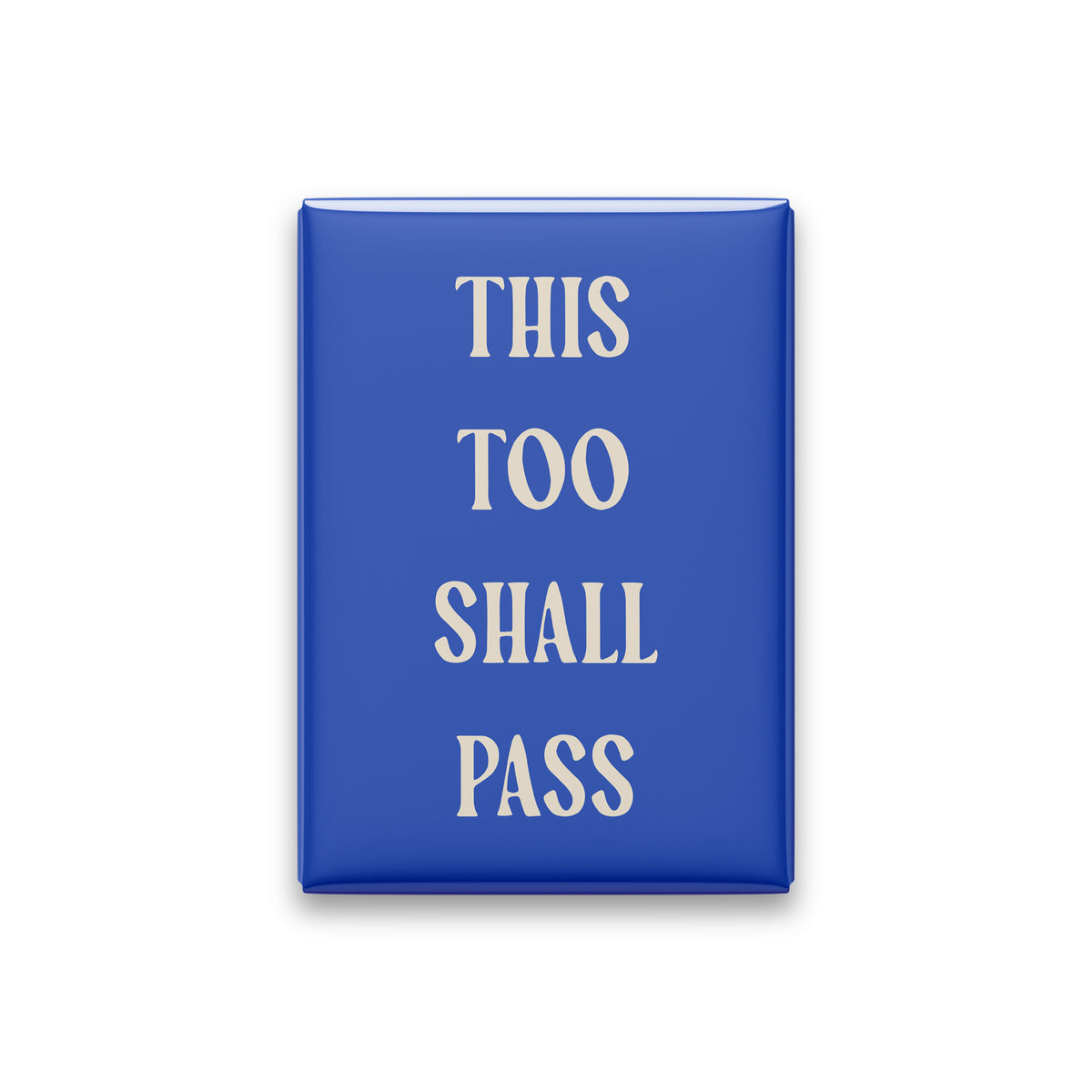 This Too Shall Pass magnet in Parchment lettering on a Cobalt background, shown on white
