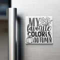 A white refrigerator magnet with black text and graphics that reads "MY FAVORITE COLORIS AUTUMN".