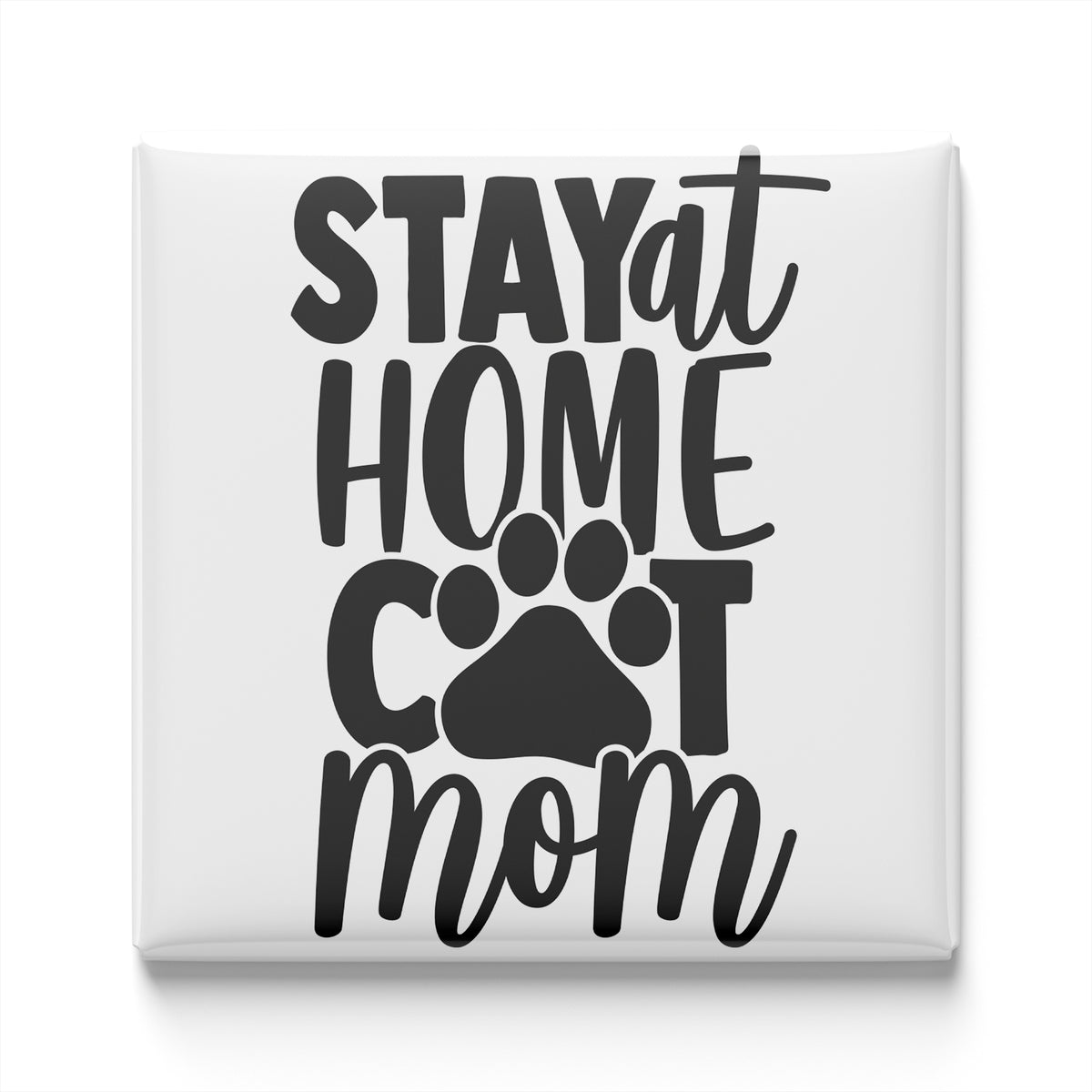 the text "STAYAT HOME COT MOM" in a stylized font, with a paw print symbol below the text.
