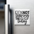 a refrigerator with a humorous text magnet that reads "100% NOT Leaving THE HOUSE TODAY".