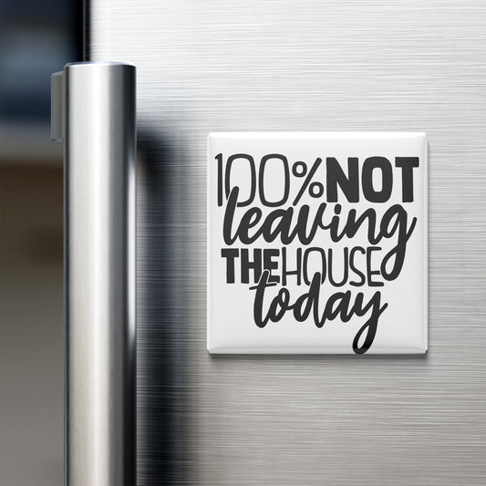 a refrigerator with a humorous text magnet that reads "100% NOT Leaving THE HOUSE TODAY".