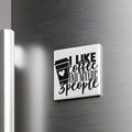 A white refrigerator magnet with the text "I LIKE coffee AND maybe 3 people" printed on it.