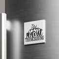 A white refrigerator magnet with the text "My first Thanksgiving" printed on it.