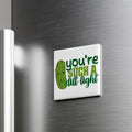 A refrigerator door with a humorous text sticker that reads "you're such a dill light".