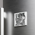 A white square magnet with the text "I LOVE fall MOST of all" printed on it, attached to a metallic surface.